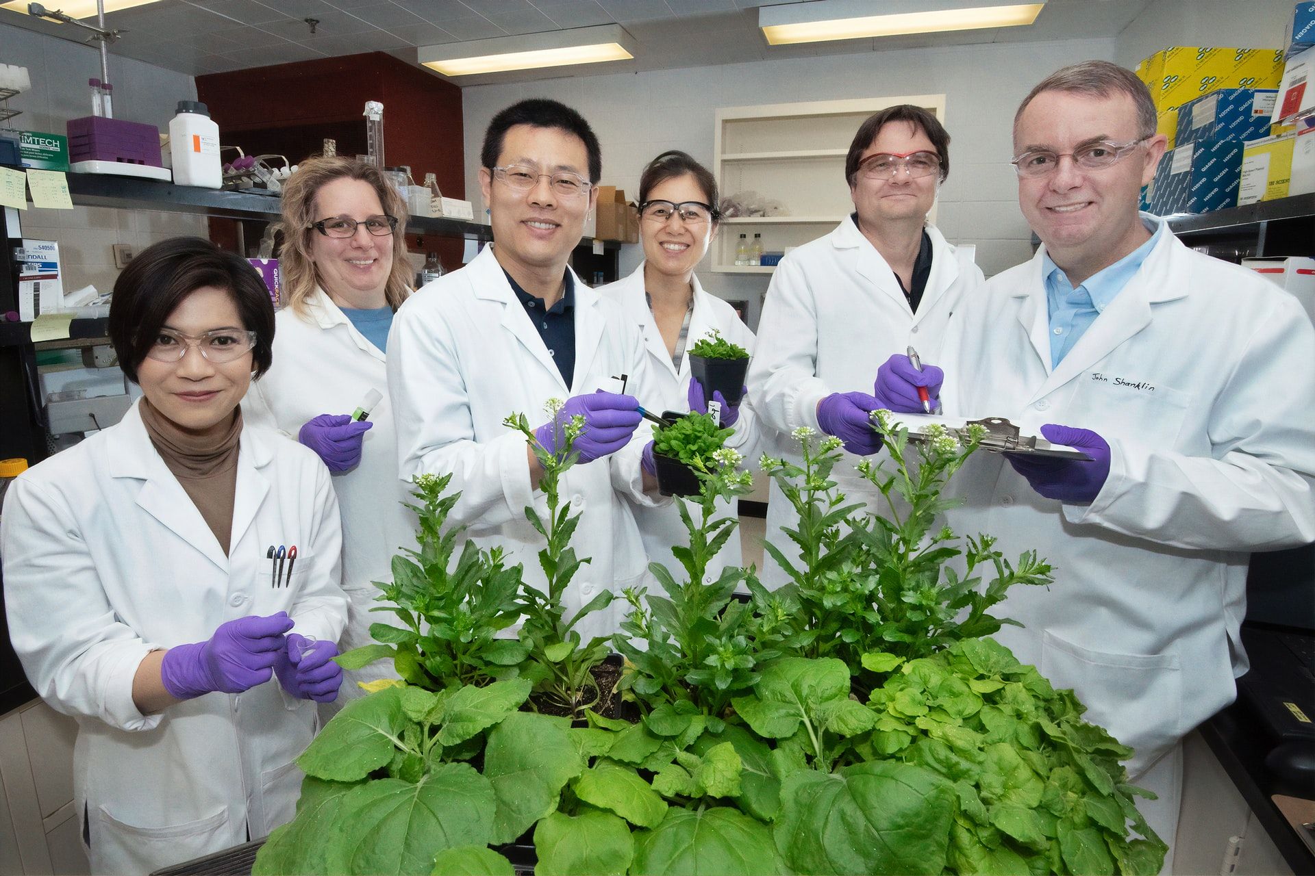 biological discoveries by a team of scientists with plant